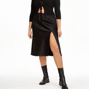Danielle Bernstein black slit skirt